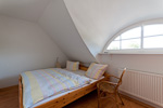 Freundliches Schlafzimmer in unserer Ferienwohnung auf Rügen